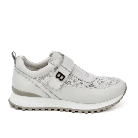 Кроссовки женские